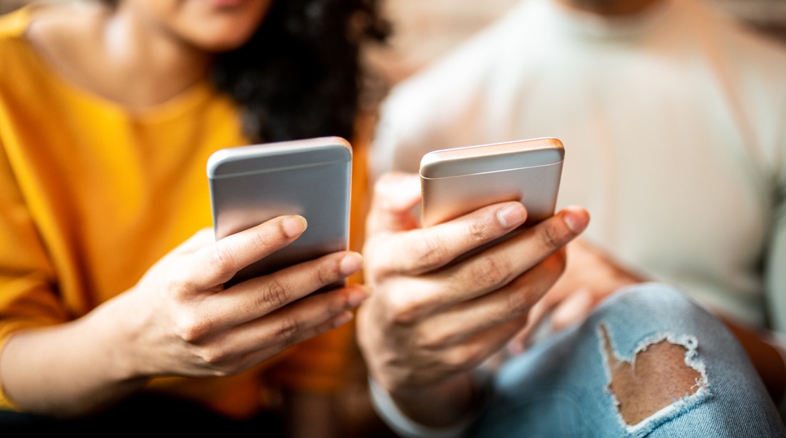Friends sending money through digital wallet